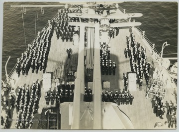 The U.S.S. West Virginia crew organized on the deck. 