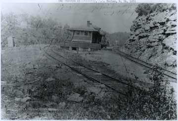 View looking at the building from across the tracks.