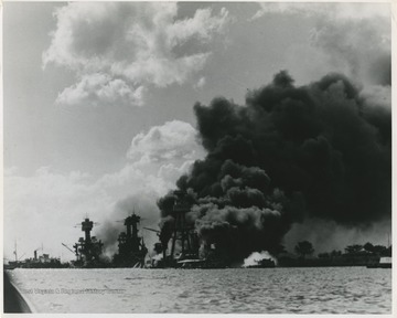 An official U.S. Navy photograph. From left to right is the U.S.S. West Virginia, U.S.S. Tennessee, and the U.S.S. Arizona. 