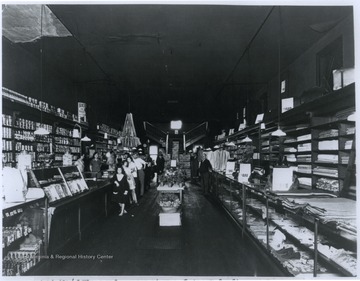 From left to right is Marie Shaffer, Gene Lee, Pearl Morris, H. M. Rogers, Bill Tidwell, Tommy and Tommy Leeper. Leeper helped build the store and then spent the rest of his life working in it. 