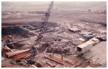 Excavation and steel delivery at construction site of new West Virginia University Medical Center.