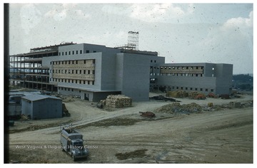 A small building labeled "Moore Electric" is visible at the construction site.