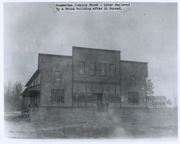 The building was later replaced by a brick building after it burned. 