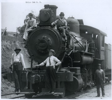 The White Oak Railway was constructed during the early-1900's and came under the control of the New River Company. The short-line railroad was originally incorporated to provide citizens of the area a direct rail-connection between the primary business centers in Beckley, Mount Hope, and Oak Hill.The railroad consisted of two unconnected "pieces" that never were completely finished. The first section consisted of about 7 and ½ miles of track connecting with the C. & O. Railway at Carlisle, running from there through Oak Hill to Stuart. The second section was about 4 to 5 miles in length connecting with the C. & O. Railway at Price Hill Junction, running to a mine located at Price Hill.Under an agreement with the C. & O. Railway, the White Oak Railway operated passenger and freight trains along the tracks of the C. & O.'s White Oak Branch  between Glen Jean and Carlisle. In 1912, the New River Company sold the locomotives and rolling stock of the White Oak Railway and jointly leased operation of the railroad to Virginian and the C. & O. 