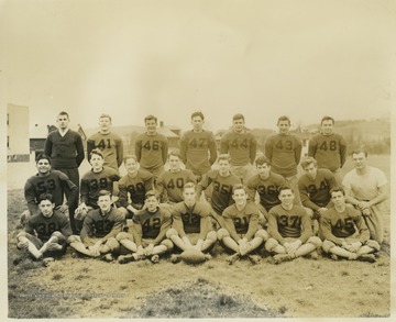 Team portrait of the St. Francis Trojans. St. Francis is a private Catholic school in Morgantown. Players unidentified. 