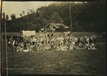 Caption below the photo reads "One community out of many who studied gypsy music and gypsy art, and pageantized it in program including one act of Il trovatore." 