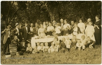 Unidentified members of the Harper family from Pendleton County, W. Va.  They are enjoying ice cream cones and ice cream sandwiches.