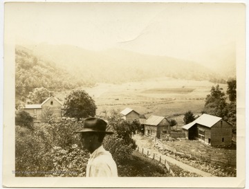 "The little log house in the center was the house of Leonard and Phebe Hinkle Harper for about 9 years."The house was still standing in 2017 in Circleville, W. Va. owned by the Warner family.