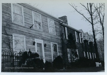 Hughart House, Stewartstown Road, Morgantown, W. Va. Home is log construction, pre-Civil War.From the thesis of "The Influences of Nineteenth Century Architectural Styles on Morgantown Homes," call number NA7125.P481965.