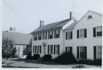 Alpha Phi Sorority house on Willey Street in Morgantown, W. Va. Federal style, built in 1855.From the thesis of "The Influences of Nineteenth Century Architectural Styles on Morgantown Homes," call number NA7125.P481965.