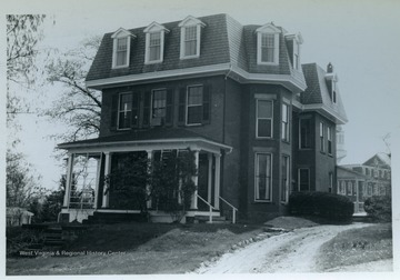 Bunker-Wade House, Prairie Avenue and Wagner Road.  Built in several styles in 1860.From the thesis of "The Influences of Nineteenth Century Architectural Styles on Morgantown Homes," call number NA7125.P481965.