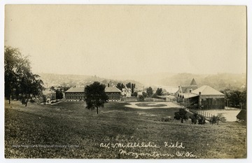 View of WVU Athletic Field. Pictured in the background are the Armory, Stewart Hall, and Commencement Hall.