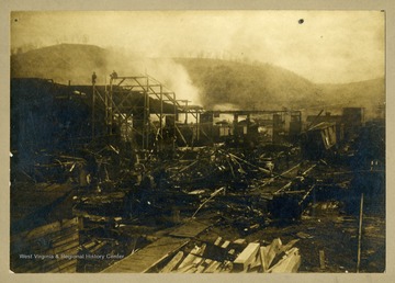 A view of the smoldering ruins of the Morgantown and Kingwood Railroad repair shops in Sabraton.