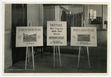 Sign reads: "Pasture, West Virginia's Main Crop Needs Improvement, For Details See Your County Agent."