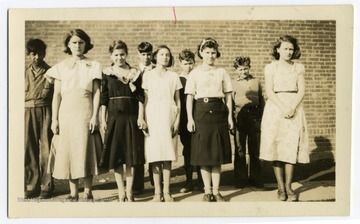 Students at the Randall School pose for a group photograph. Pictured are Julia Mayor, Amy Price, Jean DeMedici, Anna Novichenk, Pauline Fortney, Crispin Hernandez, Victor Pritchard, Charles Bond, and Louis Dallacroce.