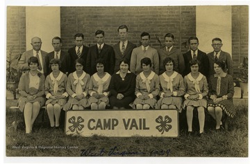 Back row left to right: W.H. Kendrick, Carol Green, Harry Rollyson, Clarence Wooter, Corty Davis, John Cole, Sam Niel, Ike Hormer, Charles Holbert.Front row left to right: Eleanor Biglow, Dorothy Archer, Gertrude Lemetol (?), Pauline Spangler, Kathleen Berthy, Eula Roberts, Virginia Burmer, Mrs. Fannie M. Kercheval.