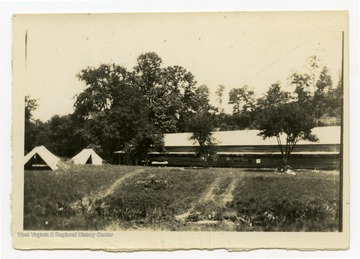 "1st dining room and kitchen down by the creek. Mill at right of building."