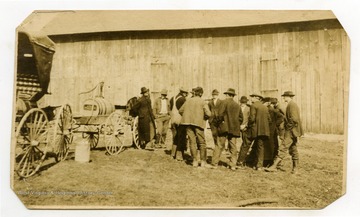 Agricultural Spraying machine mounted on buggy demonstrated for farmers.