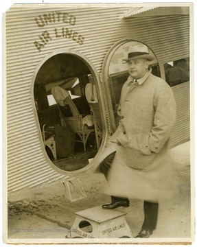 Louis Johnson, National Commander of the American Legion, boards a United Air Lines flight from Cleveland to Chicago.