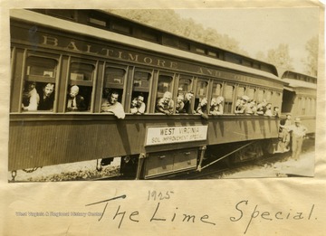 Men aboard Baltimore and Ohio Railroad car labeled "West Virginia Soil Improvement Special."