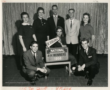 Front left to right: Guy Farmer of Lincoln County, Electric winner; Miss Margaret Adele Bigelow of Wood County, Alumni recognition; Kenneth Kissel of Marshall County, forestry winner.Standing left to right: Aleta Rae Strader ofUpshur County, Canning winner; Sally Ann Ours of Grant County, Achievement winner; Ralph Izard of Boone County, recreation winner; Dwaine Hornbeck of Upshur County, beautification of home grounds winner, and Joan Lee of Kanawha County, leadership winner. 