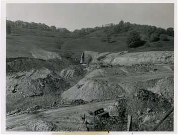 Agricultural land being stripped by the C and P Coal Company in Taylor County. After mining, this land will be leveled and sloped for drainage, then restored to productive farm cover.