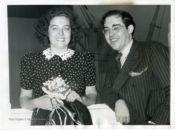 Text on the back reads, "New York City: Senator Rush D. Holt, of West Virginia, and his sister, Mrs. Ralph K. Chase, pictured on the liner S. S. Mormachawk, August 4th, as they sailed from here for Norway, where Senator Holt will attend the Interparliamentary Congress. Mrs. Chase's husband, a member of the U. S. Maritime commission, also sailed on the liner." 