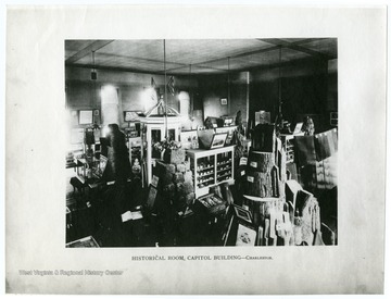 The photo shows a room in the Capitol Building where artifacts of import in West Virginia's history are stored. 