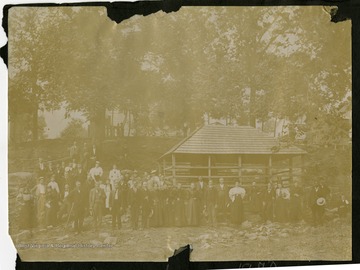 A large group of people get together at a pavilion in Webster Springs, a town known for its hot sulphur springs and large hotel. 