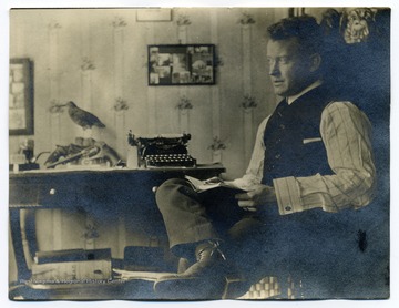 An engineer named McCormick relaxes at his home in Pittsburgh, P. A.