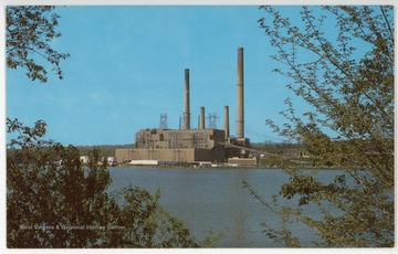 Text on back reads, "West Virginia Energy Center, Mt. Storm Power Station, Star Route Box 430, Mt. Storm, WV 26739. The Mount Storm Power Station is located on Mt. Storm Lake in the rugged Allegheny Mountains of north-eastern West Virginia. The 1,200-acre lake, built to serve the power station, also serves as a public recreation center. The station is known as a "mine-mouth" plant and is the largest coal-fired power station owned and operated by Virginia Power." 