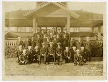 Back Row: unknown, Niskalas, Fonda, Collins, Payne, [illegible]Middle Row: Butt, McDonald, Otard, Crush, unknown, [illegible], Spiro, Fletcher, A. Alexander, Hurst, R. ThomasChief Patterson, Bos'n AnklerFirst Row: Creekmore, Edmunds, Ervin, Bozard, Ens. White, Lt. Compton, Lt. Rosenkrans, Day, [illegible], J. Thomas, Willis