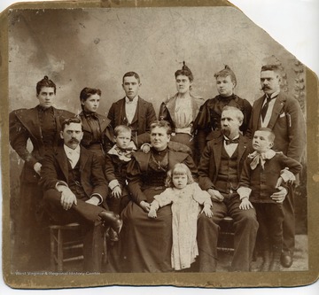 Front Row(L to R) Anthony Bowden, Freddy(cousin), Mary Kelley, Isaac Sr., Isaac Jr., Little Mary(cousin). Freddy+Mary were Frank+Maggie's children.Back Row(L to R) Cora Kelley Bowen, Lillian Kelley, John Kelley, SarahJane ("Jenny") Kelley. Maggie+Frank Kelley.