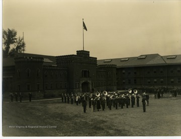 Back of photo reads: "R.O.T.C. Cadet Band in action at West Virginia University, Morgantown, W. Va."