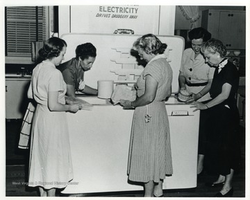 Woman identified as Helen Waters, Hazel Dillon, Dorothy A. Schultz, Daisy Davis, and Dorothy Harris.