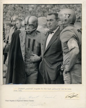 Fred Wyant (WVU QB), Art Lewis (Head Coach), and Bruce Bosley (WVU-T)