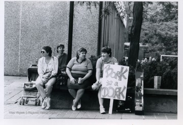 Barb Fleischauer and Barb Howe recovering from marching in the Block Bork protest.