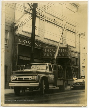 The Loving Furniture store front receiving maintenance.