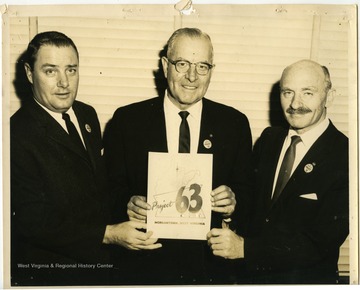 Milton Cohen (third from left) and others presenting Project 63, a celebration of West Virginia's centennial.