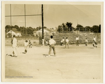 Children playing baseball at a field in Morgantown, West Virginia.