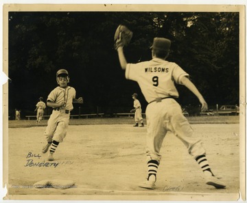 Bill Doherty (left) and Wilsons (right) playing baseball in Morgantown, West Virginia.