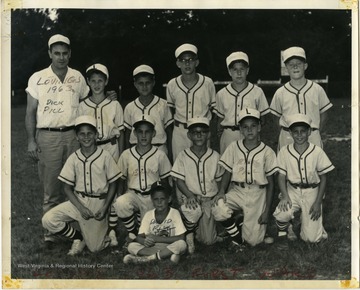 A photo of the 1963 Lovings First Ward Little League baseball team. Named individuals in the photo include Dick Pill (coach) and David Pill (player, seated).