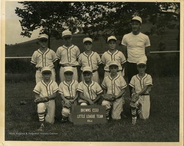 Coach Jack Clice with his 1964 Browns Esso Little League baseball team.