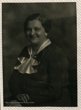 Portrait of Ruby Gibson in Scott Gibson's Photographic Studio in Morgantown, W. Va. 